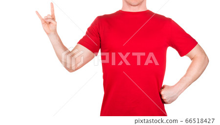 Man in red t-shirt showing rock n roll sign or giving the devil horns gesture Man in red t-shirt showing rock n roll sign or giving the devil horns gesture 66518427