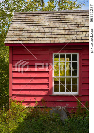 beautiful antique window in a wooden house in the beautiful antique window in a wooden house in the 66521287