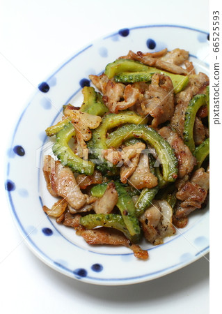 Fried bitter melon and pork, white background Fried bitter melon and pork, white background 66525593