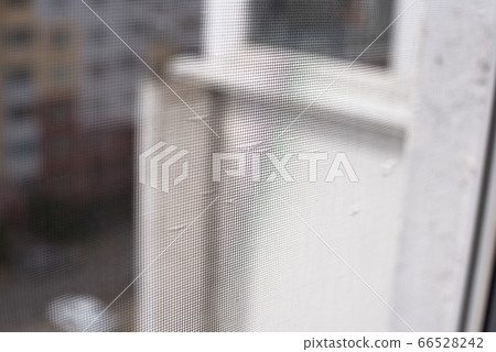 Background mosquito net on the window and view of Background mosquito net on the window and view of 66528242
