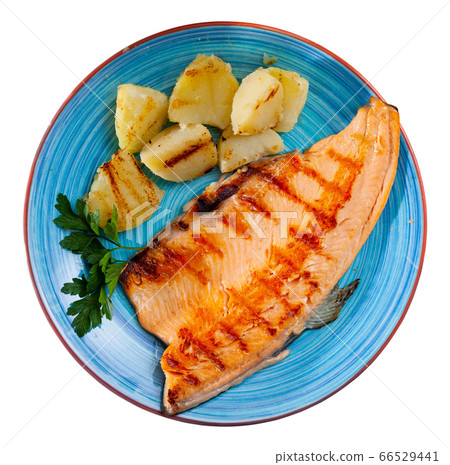 Grilled trout fillet with potatoes Grilled trout fillet with potatoes 66529441