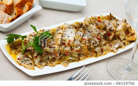 Homemade spicy marinated herring 66529706