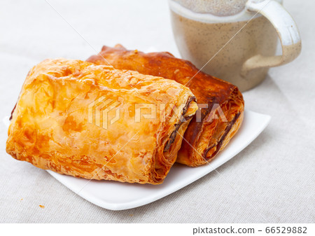 Napolitana with meat and cheese, spanish pastry Napolitana with meat and cheese, spanish pastry 66529882