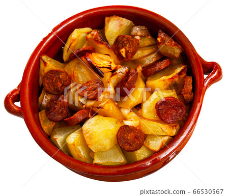 Spanish dish - potatoes with sliced chorizo sausage 66530567