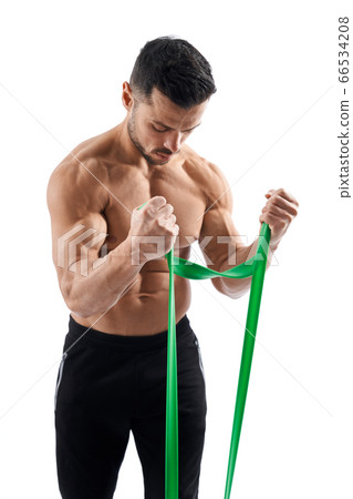 Bodybuilder training arms with resistance band. Bodybuilder training arms with resistance band. 66534208