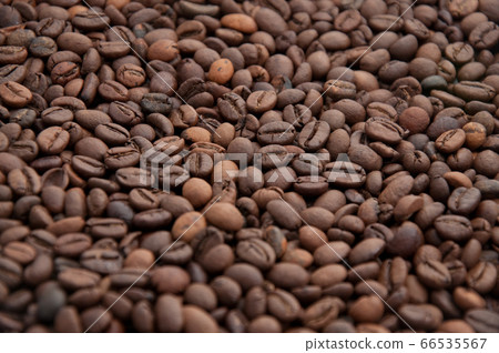 Roasted coffee beans background Roasted coffee beans background 66535567