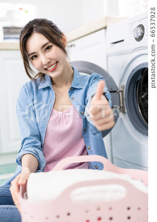 Asian woman wash clothes Asian woman wash clothes 66537928