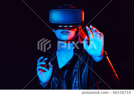emotional girl in virtual reality glasses plunges into cyberspace emotional girl in virtual reality glasses plunges into cyberspace 66538719