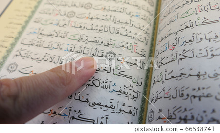 Arab Man Reading The Quran Arab Man Reading The Quran 66538741