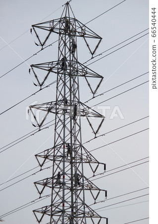 Steel tower repair, steel tower maintenance, workers Steel tower repair, steel tower maintenance, workers 66540444