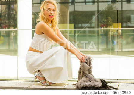 Woman wearing crop top and culottes 66540930