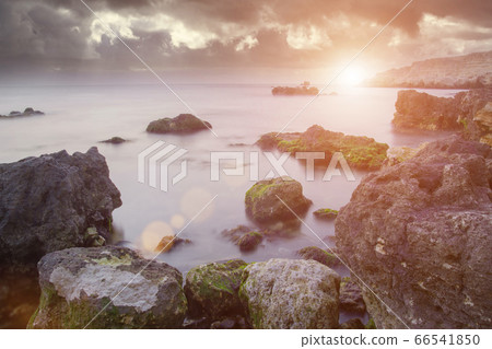 Stones on coast at moving sea, Black Sea at 66541850