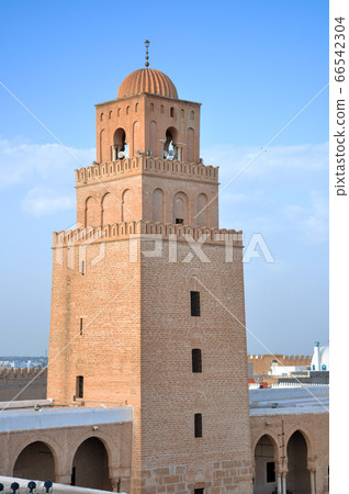 Landscape of the Ouled Farhane Cemetery with the Great Mosque in Kairouan, Tunisia 66542304