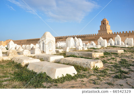 Landscape of the Ouled Farhane Cemetery with the Great Mosque in Kairouan, Tunisia Landscape of the Ouled Farhane Cemetery with the Great Mosque in Kairouan, Tunisia 66542329