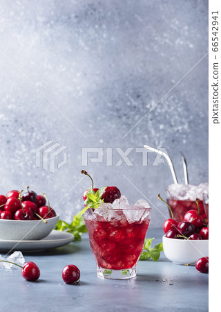 Summer alcholic coktail with cherry Summer alcholic coktail with cherry 66542941