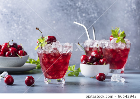 Summer alcholic coktail with cherry Summer alcholic coktail with cherry 66542942
