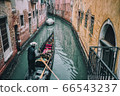 Italy venetian gondola cityscape 66543237