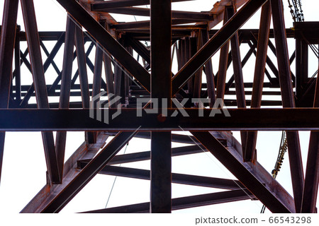 A high-voltage electricity tower. A High-voltage 66543298