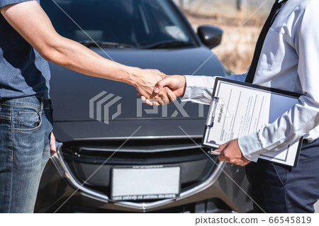 Insurance Agent and customer shaking hands after Insurance Agent and customer shaking hands after 66545819