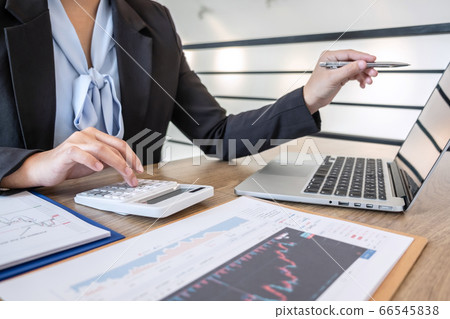 Businesswoman working and planning in investment Businesswoman working and planning in investment 66545838