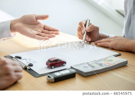 Car rental and Insurance concept, Young salesman Car rental and Insurance concept, Young salesman 66545975