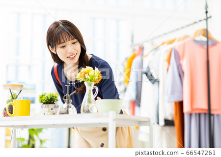 Young women in their twenties shopping Young women in their twenties shopping 66547261