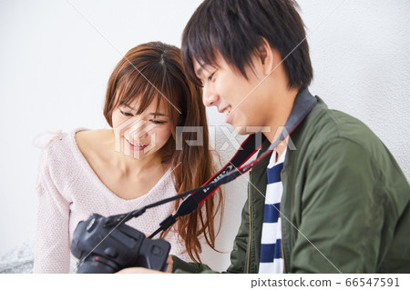 Young photographer and model woman Young photographer and model woman 66547591