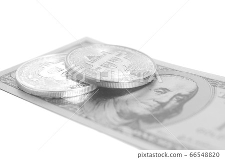 Silver bitcoins with U.S. dollar isolated on white 66548820