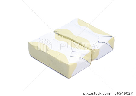 wrapped butter sticks isolated on white background 66549027