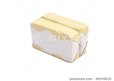 Wrapped butter sticks isolated on a white 66549029