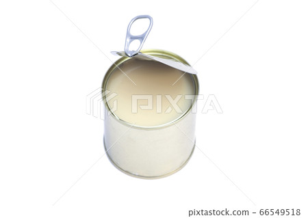 Condensed milk in tin can isolated on white 66549518