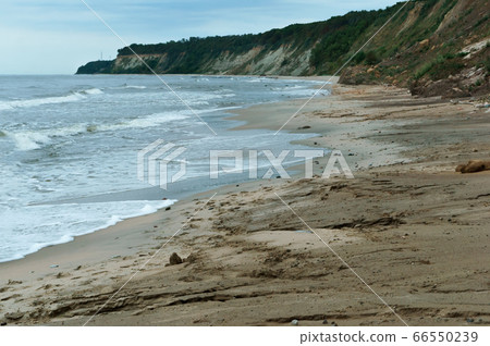 steep coast of the sea, landslides and destruction steep coast of the sea, landslides and destruction 66550239