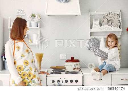 Mother with little daughter having fun at home Mother with little daughter having fun at home 66550474