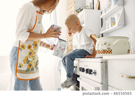 Mother with little children having fun at home 66550565