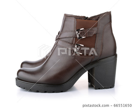 Side view of brown leather woman winter boots Side view of brown leather woman winter boots 66551650