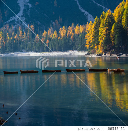 Autumn peaceful alpine lake Braies or Pragser 66552431