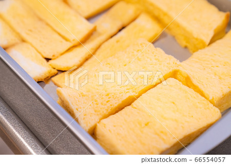 A photo of delicious French toast (during cooking) A photo of delicious French toast (during cooking) 66554057
