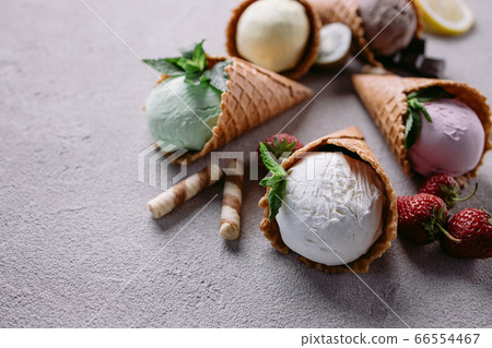 Ice cream on grey table, seasonal food background 66554467