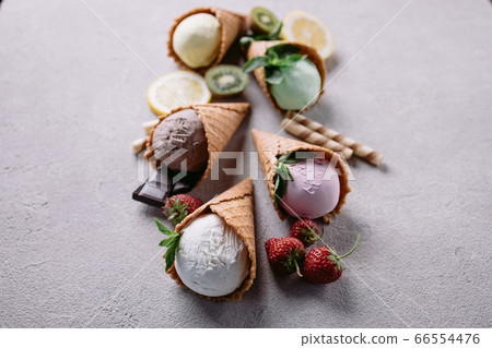 Ice cream on grey table, seasonal food background 66554476