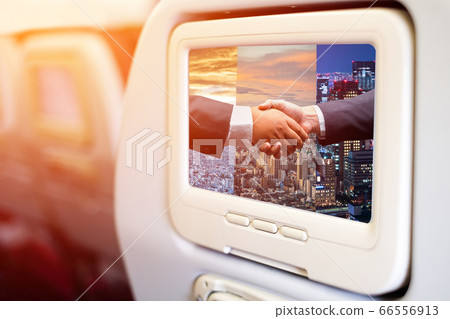 Aircraft monitor in front of passenger seat 66556913