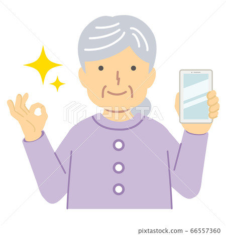 Senior lady in purple clothes / OK sign 66557360