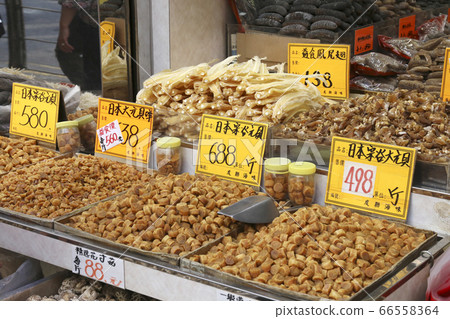 Japanese dried scallops sold at a dry food store in Tokusuke, West Hong Kong. The highest grade is Japanese and expensive Japanese dried scallops sold at a dry food store in Tokusuke, West Hong Kong. The highest grade is Japanese and expensive 66558364