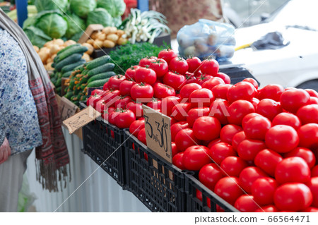 Ripe tomatoes on the counter of the Belarussian 66564471
