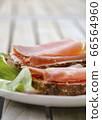 Brown bread with smoked ham 66564960