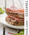 Brown bread with smoked ham 66564961