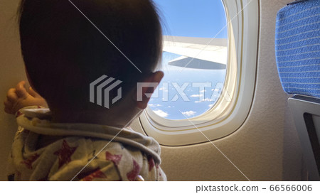 Baby and airplane 66566006