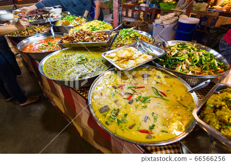 Thai foods style Rice and Curry Thai street foods at market Bangkok of Thailand. Thai foods style Rice and Curry Thai street foods at market Bangkok of Thailand. 66566256