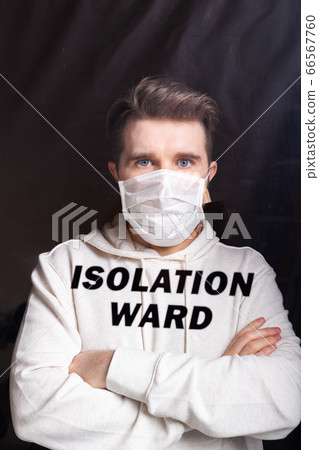 Hospital quarantine or isolation of patient standing alone in room with hopeful for treatment of Coronavirus COVID-19 Pandemic, Outbreak Efforts prevent virus spreading hazard controls concept. 66567760