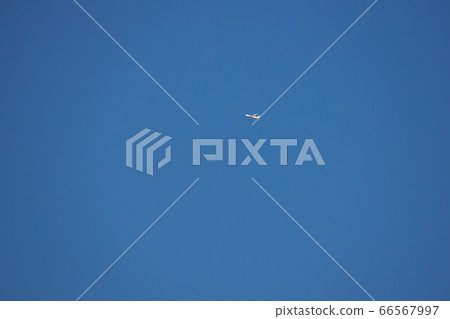 blue sky, air plane, blank expression 66567997