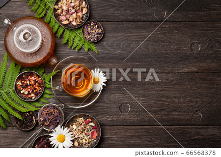 Various herbal tea, teapot and cup 66568378